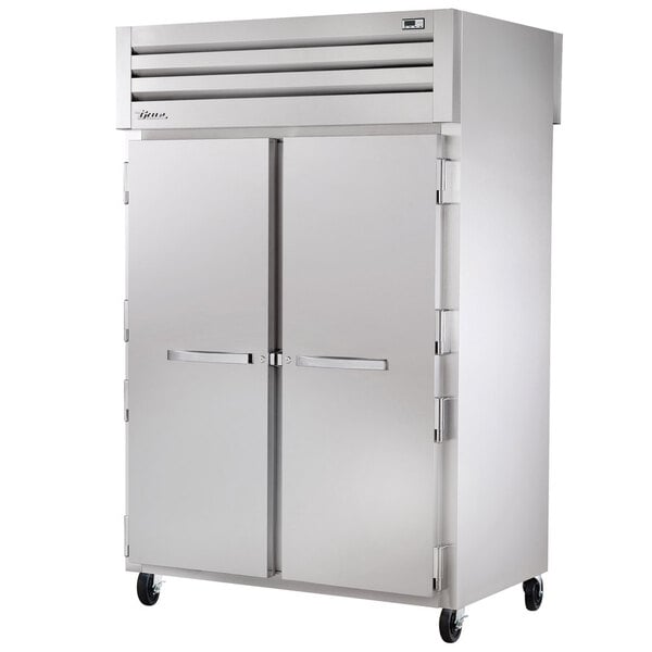 True Manufacturing STA2RPT-2S-2S-HC Spec Series 52 5/8" Solid Door Pass-Through Refrigerator with Chrome-Plated Shelves