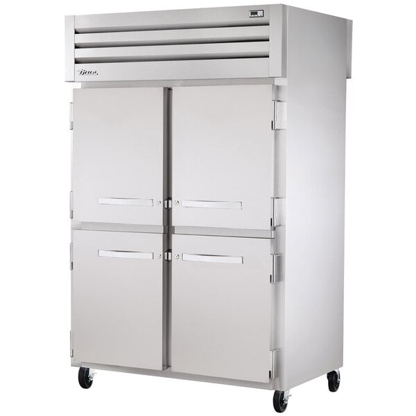 True Manufacturing STR2RPT-4HS-2S-HC Spec Series 52 5/8" Stainless Steel Half Solid Front, Solid Back Door Pass-Through Refrigerator